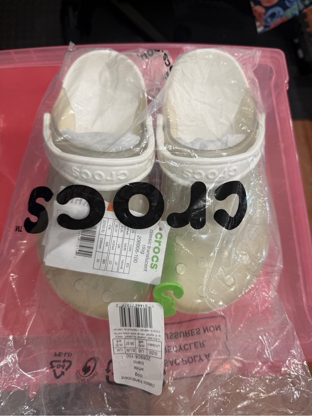 Crocs Kids Classic translucent Clogs in White/Cream
